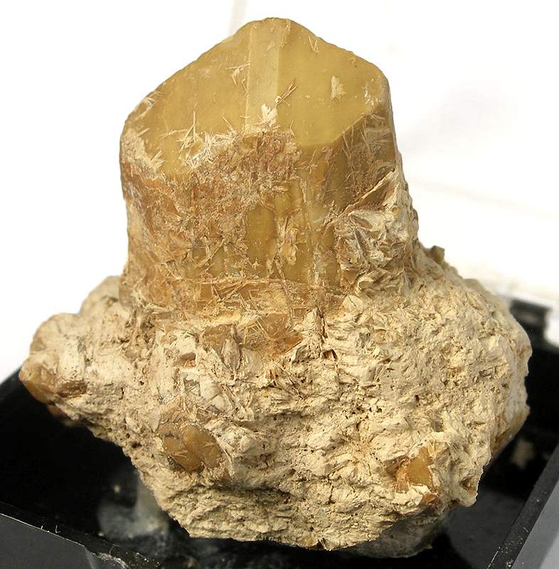 Talc, a white/green/gray mineral
